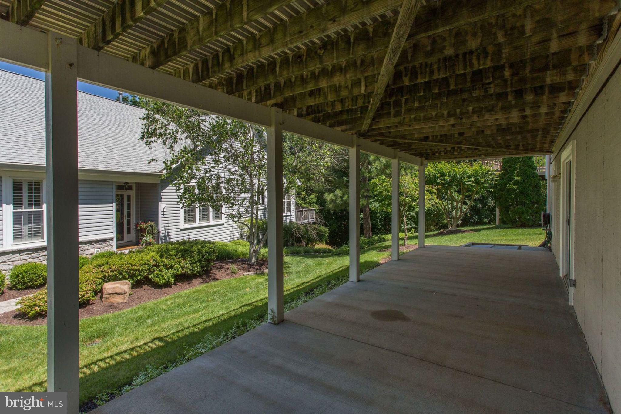 13550 Ryton Ridge Lane Gainesville, VA 20155 - Photo 45 of 46 Concrete patio under Deck