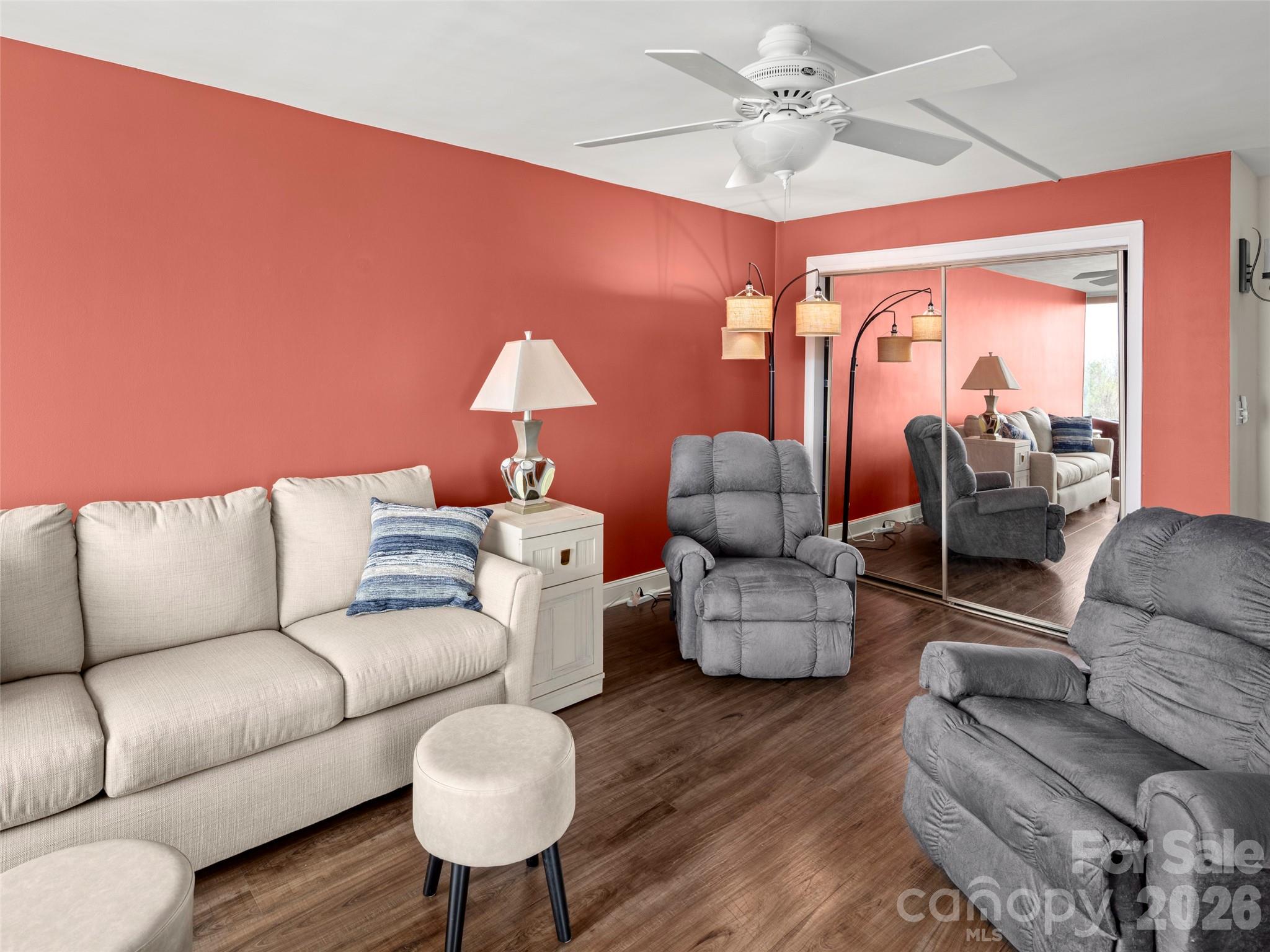 647 Town Mountain Road, Unit 612 Asheville, NC 28804 - Photo 5 of 10 a living room with furniture and a lamp