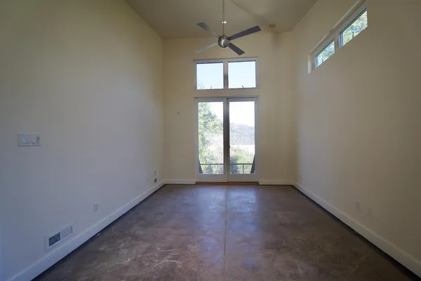 an empty room that has a window