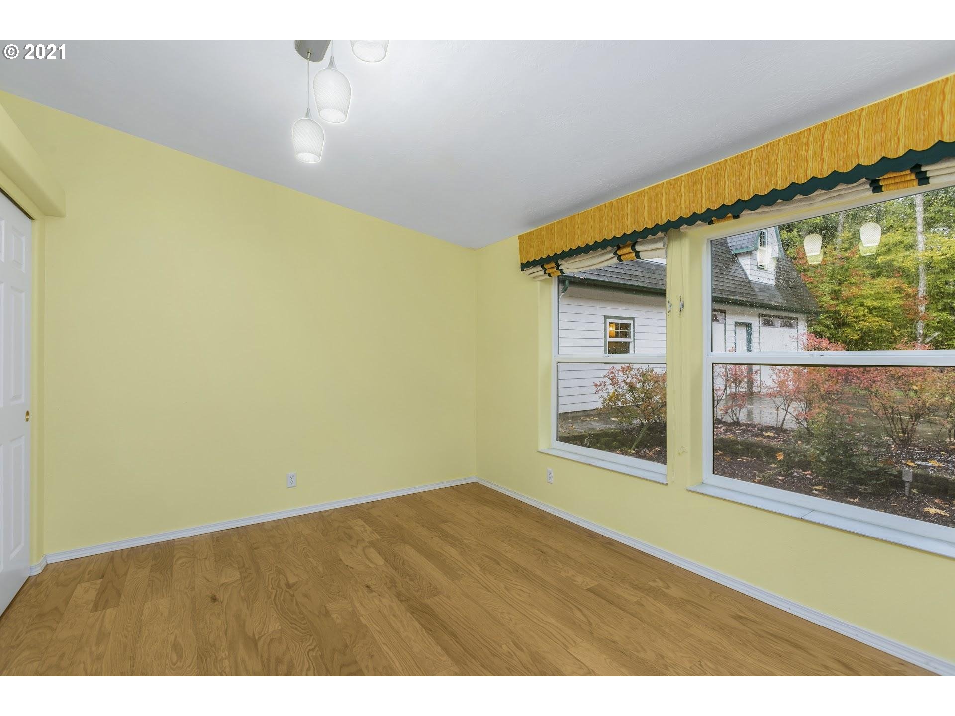 212 Northeast 253rd Street Ridgefield, WA 98642 - Photo 12 of 28 a view of an empty room with a window