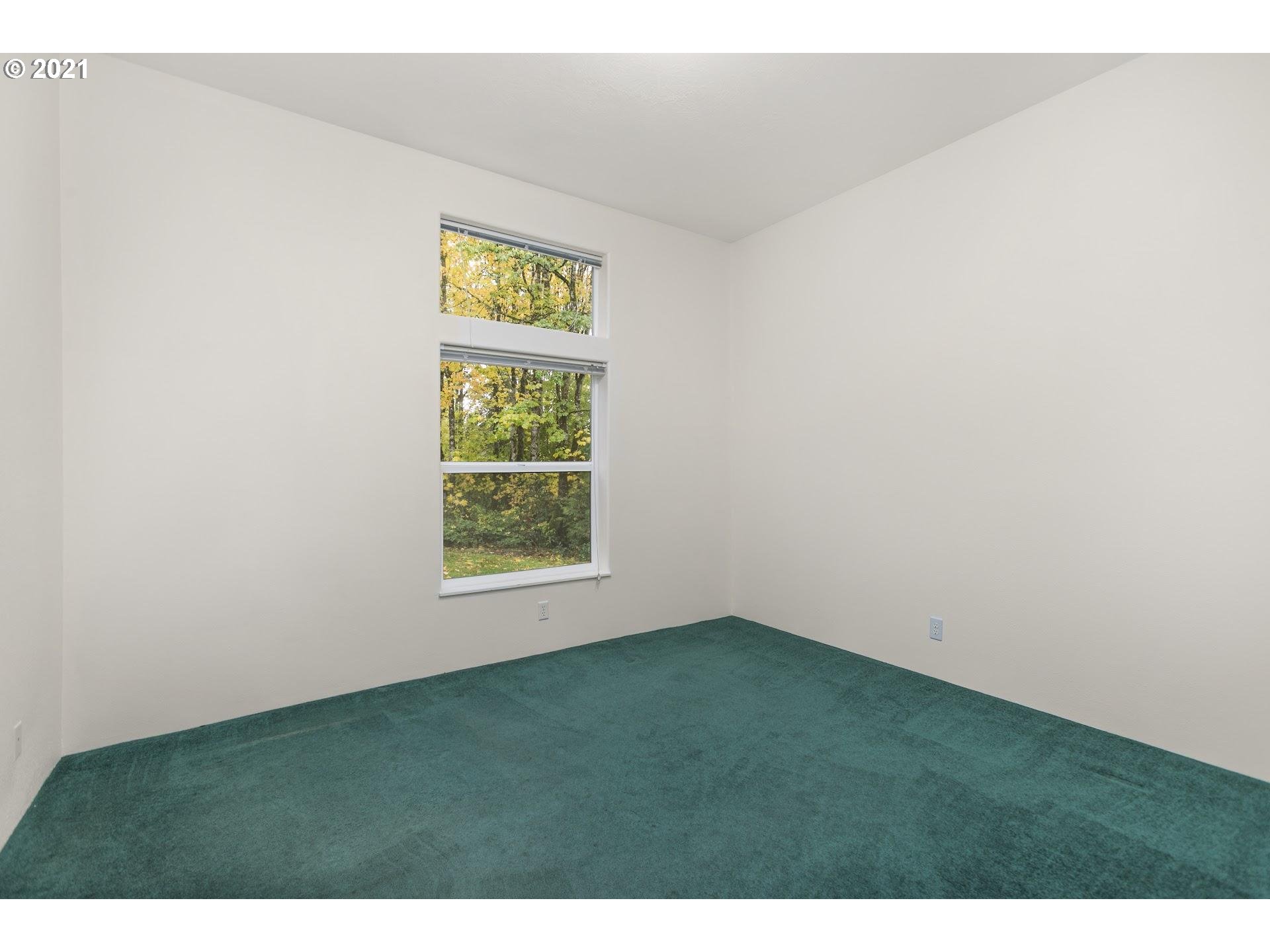 212 Northeast 253rd Street Ridgefield, WA 98642 - Photo 15 of 28 a view of an empty room with window