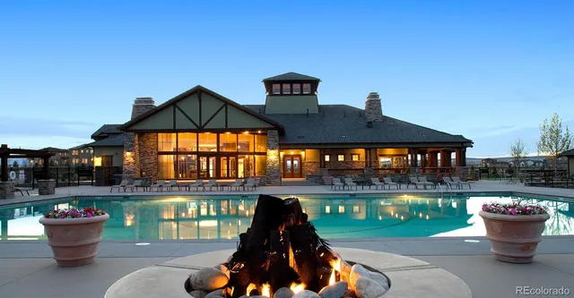 a front view of a house with backyard