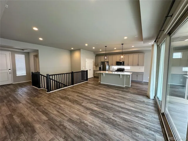 a view of a kitchen with a sink