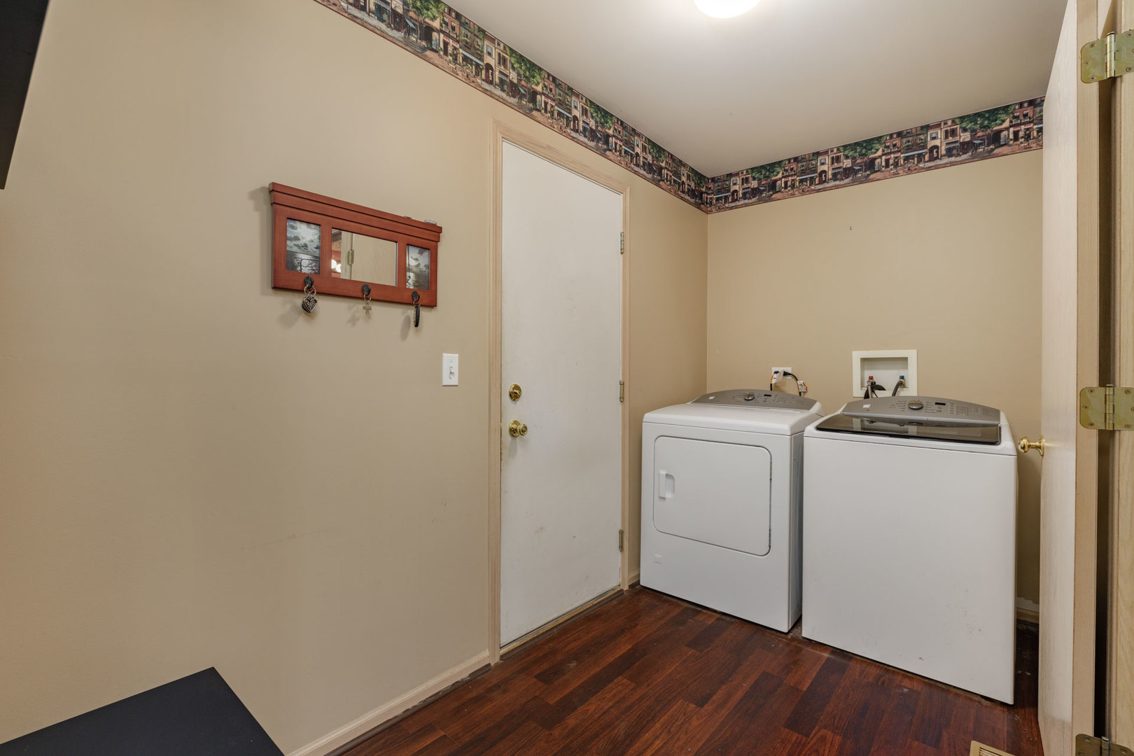 11654 Olympic Drive Plainfield, IL 60585 - Photo 12 of 25 a view of a storage & utility room with a washer dryer