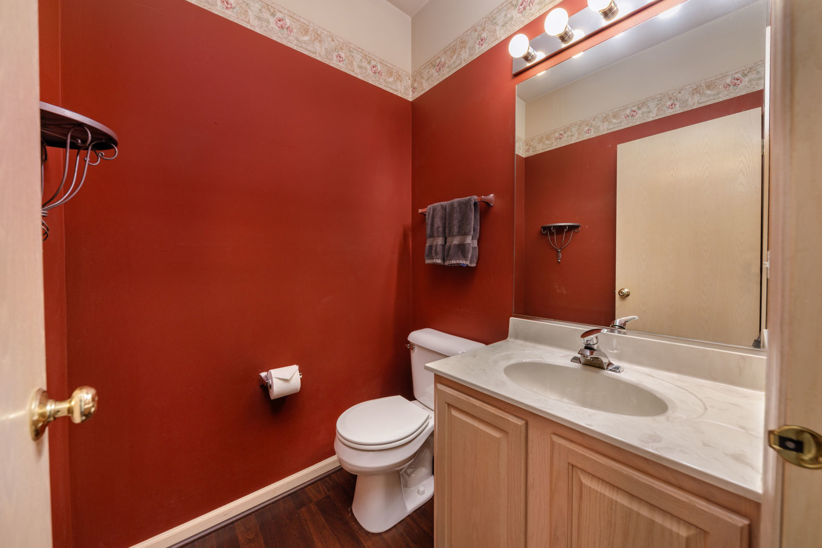 11654 Olympic Drive Plainfield, IL 60585 - Photo 13 of 25 a bathroom with a sink a toilet and shower