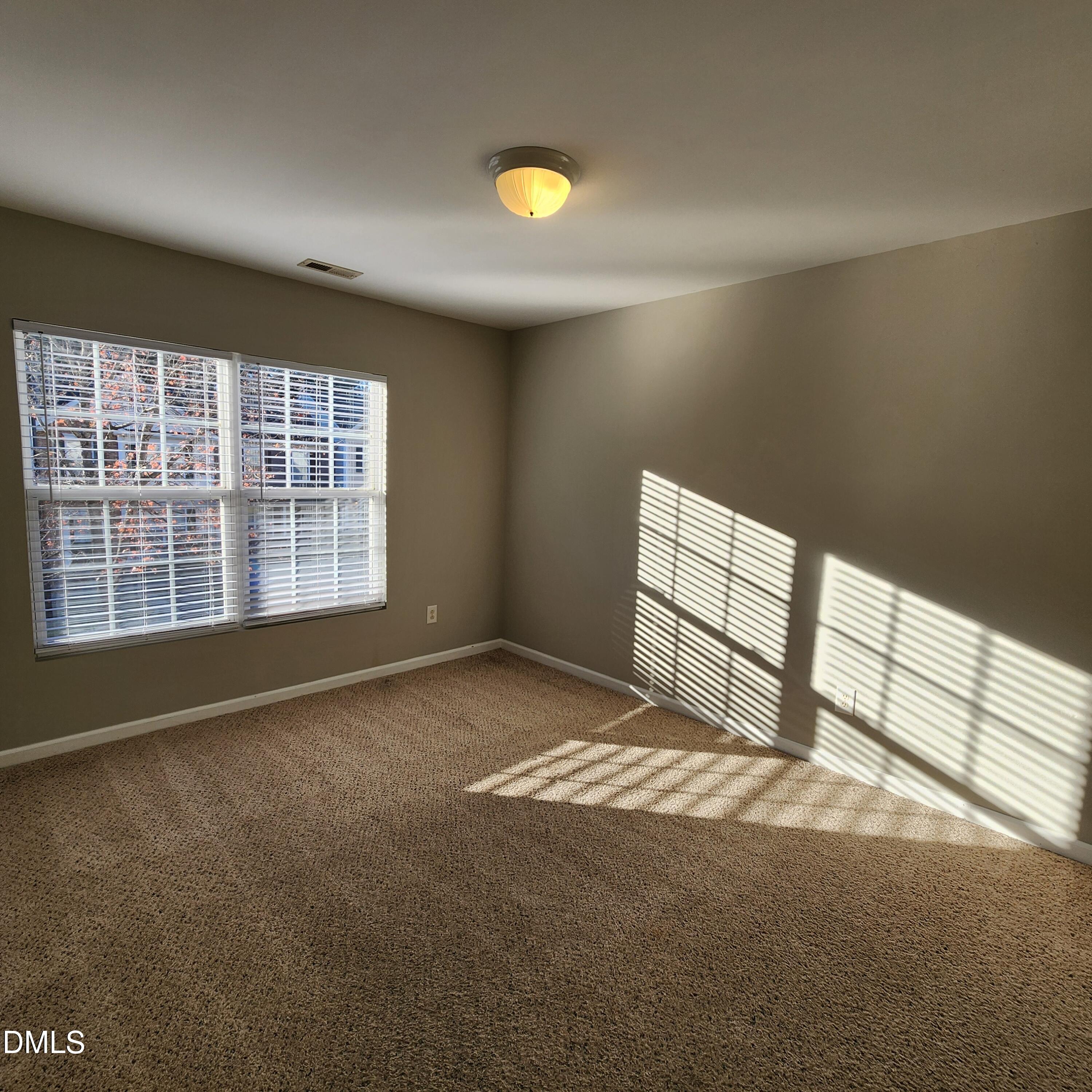 8212 Clasara Circle Raleigh, NC 27613 - Photo 19 of 20 Second bedroom
