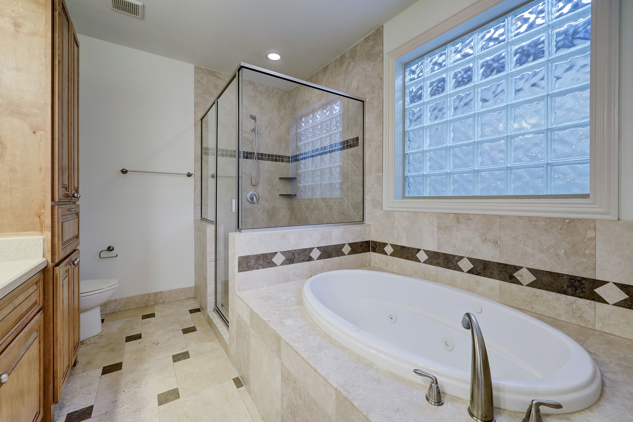 1805 Arbor Street Houston, TX 77004 - Photo 19 of 25 a bathroom with a bathtub and a shower