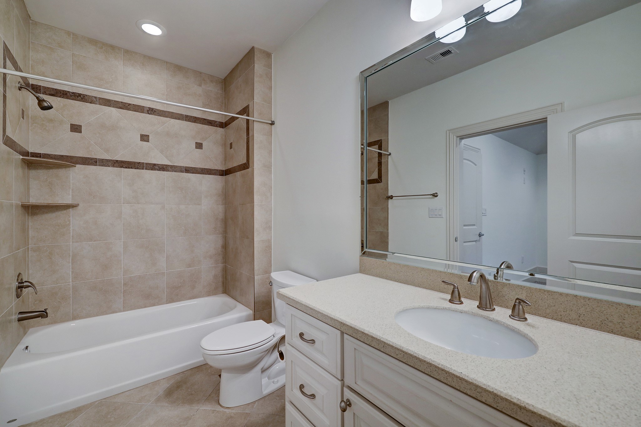 1805 Arbor Street Houston, TX 77004 - Photo 8 of 25 a bathroom with a granite countertop sink toilet tub and shower