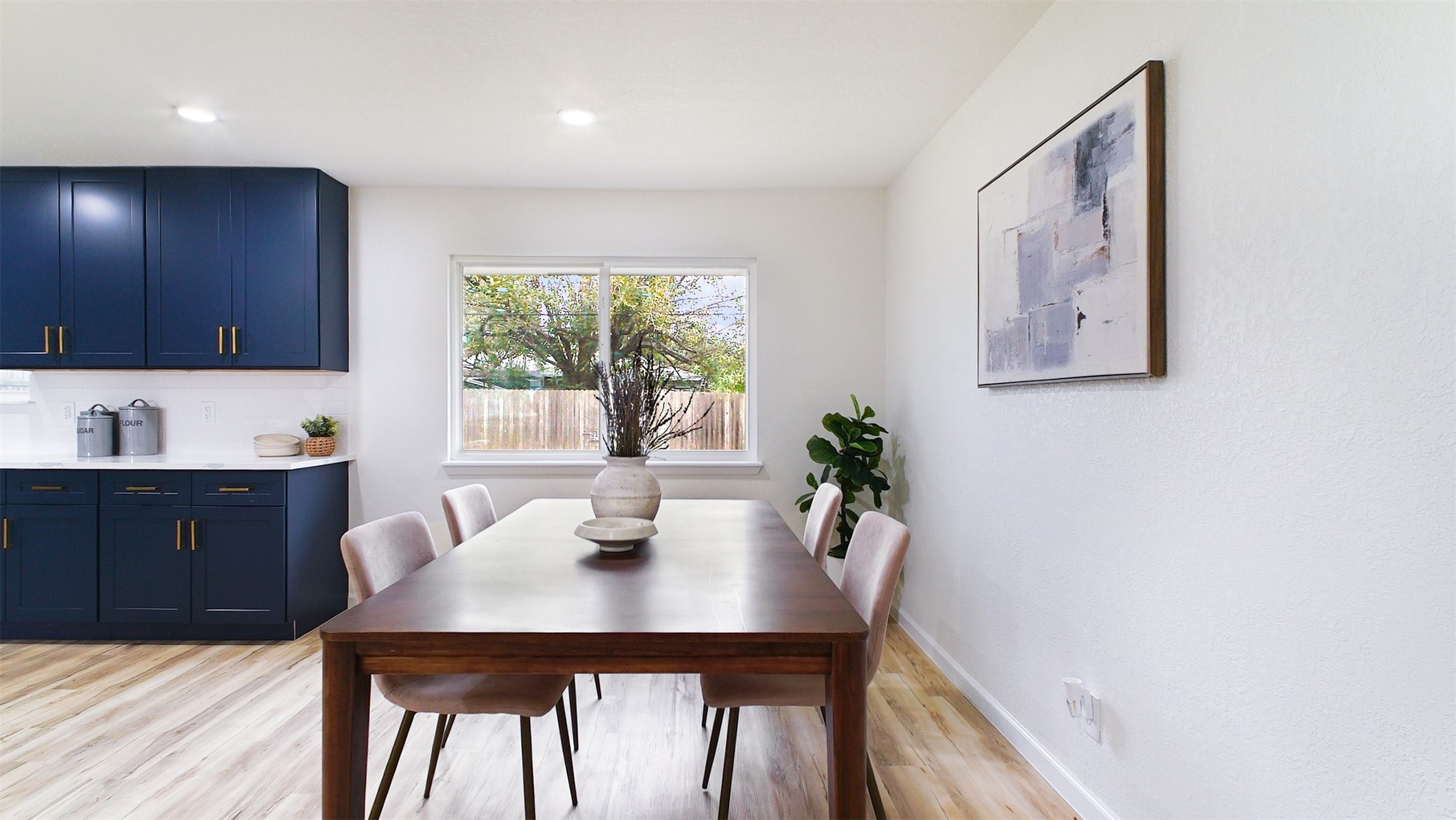3513 Tanglebriar Drive Pasadena, TX 77503 - Photo 9 of 21 a view of a dining room with furniture window and wooden floor