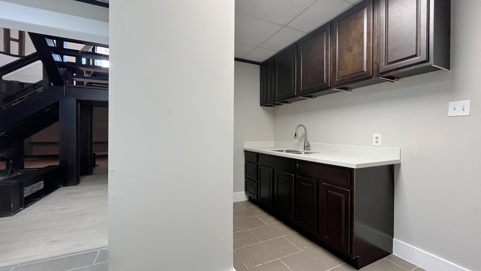 9220 Rasmus Drive Houston, TX 77063 - Photo 14 of 20 a kitchen with stainless steel appliances granite countertop a refrigerator and a sink