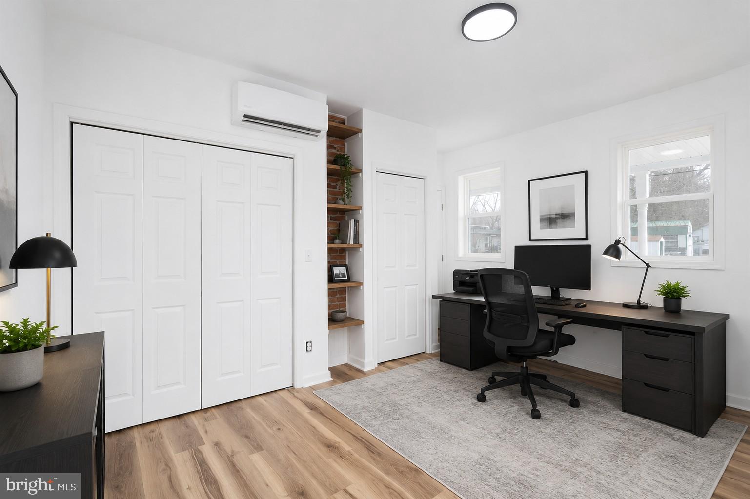 5026 Bethlehem Road Preston, MD 21655 - Photo 19 of 25 a view of a workspace with furniture and a window
