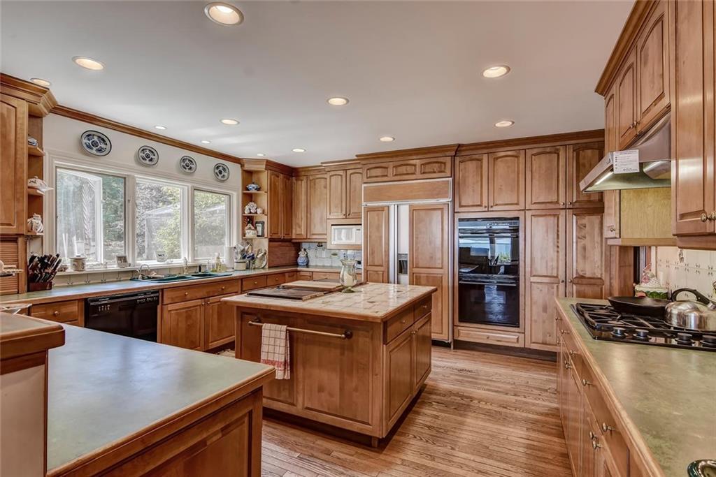 536 Reach Road Deer Isle, ME 04627 - Photo 14 of 33 Kitchen has gas cooktop and an...