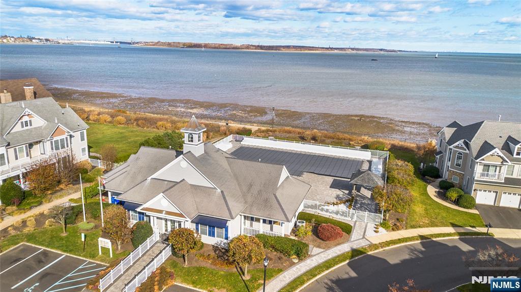 43 South Shore Drive, Unit 81 South Amboy, NJ 08879 - Photo 4 of 30 a view of walk in closet with clothes and shoes