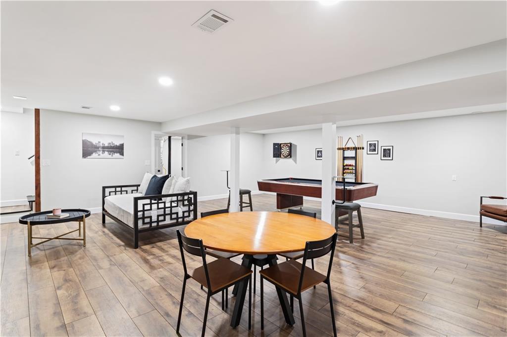 5925 Old Bill Cook Road Atlanta, GA 30349 - Photo 23 of 49 a view of a dining room with furniture and wooden floor