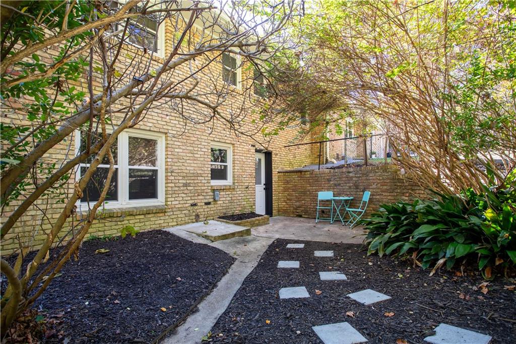 5925 Old Bill Cook Road Atlanta, GA 30349 - Photo 38 of 49 a view of a house with a yard