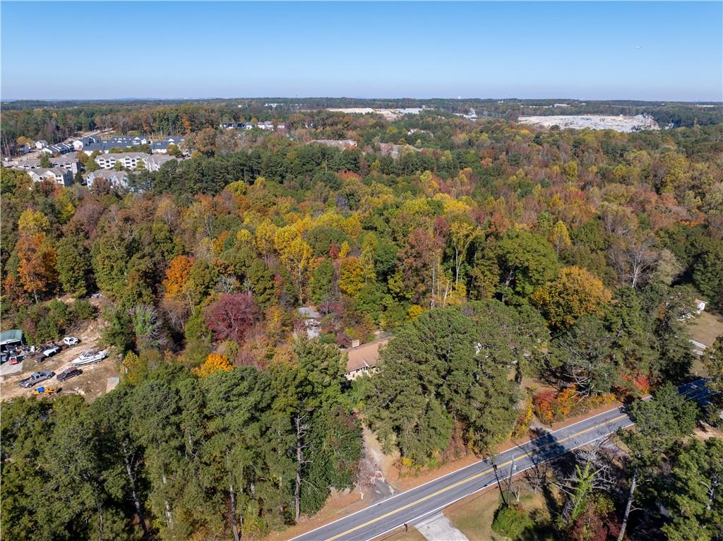 5925 Old Bill Cook Road Atlanta, GA 30349 - Photo 43 of 49 an aerial view of residential houses with outdoor space and trees
