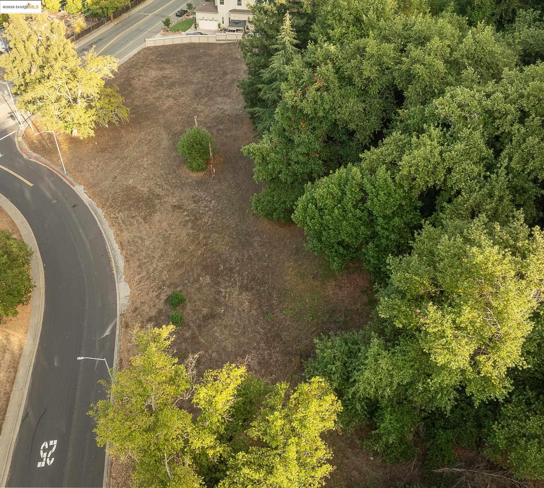 3300 Pinole Valley Road Pinole, CA 94564 - Photo 3 of 13 an aerial view of a residential houses with yard