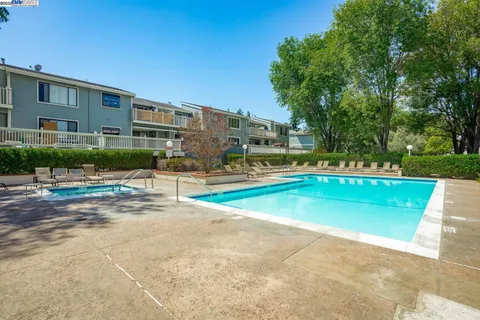 a view of a house with a swimming pool