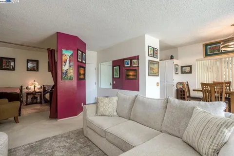 a living room with furniture and a couch