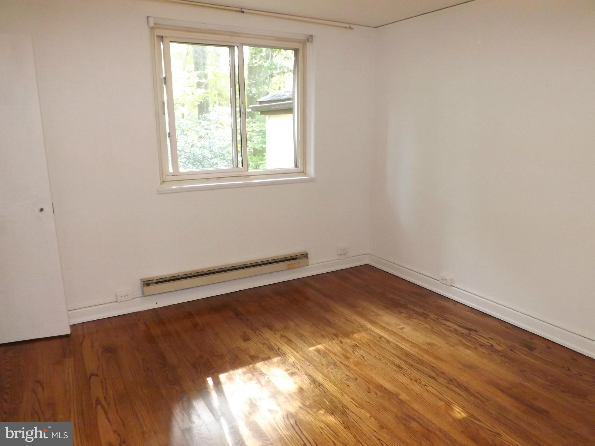 6 Ridge Road, Unit Q Greenbelt, MD 20770 - Photo 17 of 30 Refinished Wood Floors + New Baseboard Heaters