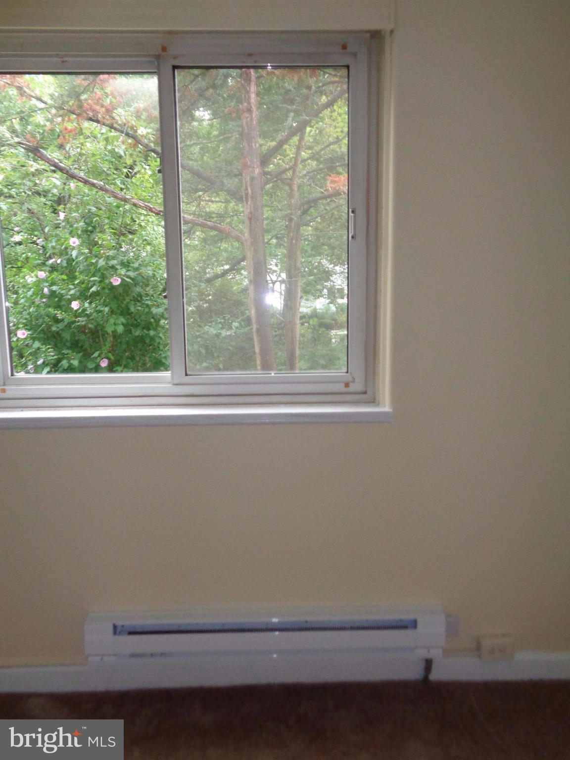 6 Ridge Road, Unit Q Greenbelt, MD 20770 - Photo 4 of 30 Living Room with New Heaters and Thermostat