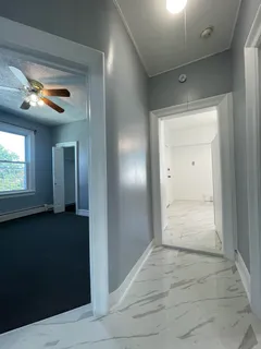 a kitchen with a stove a sink and a refrigerator