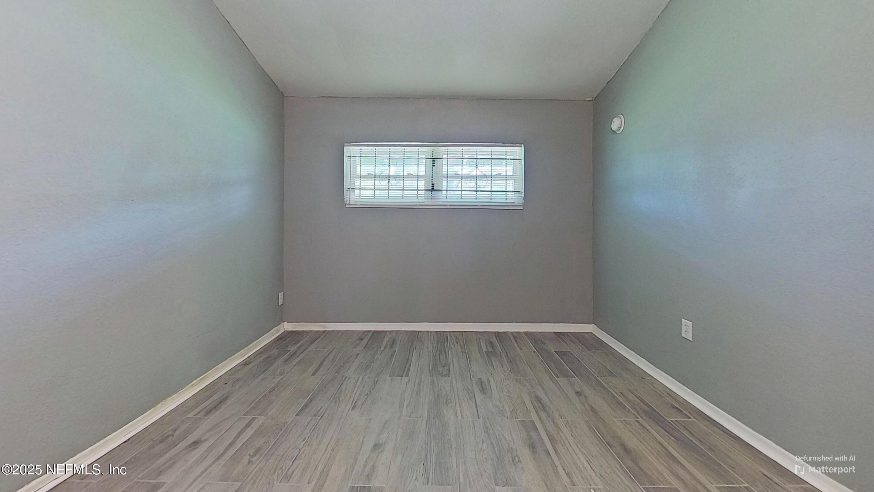 9276 Greenleaf Road Jacksonville, FL 32208 - Photo 11 of 14 Living-Room-Defurnished (2)