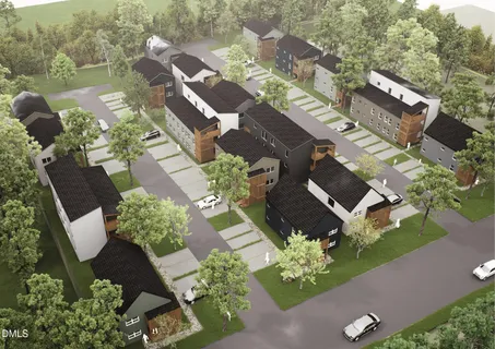 an aerial view of houses with outdoor space