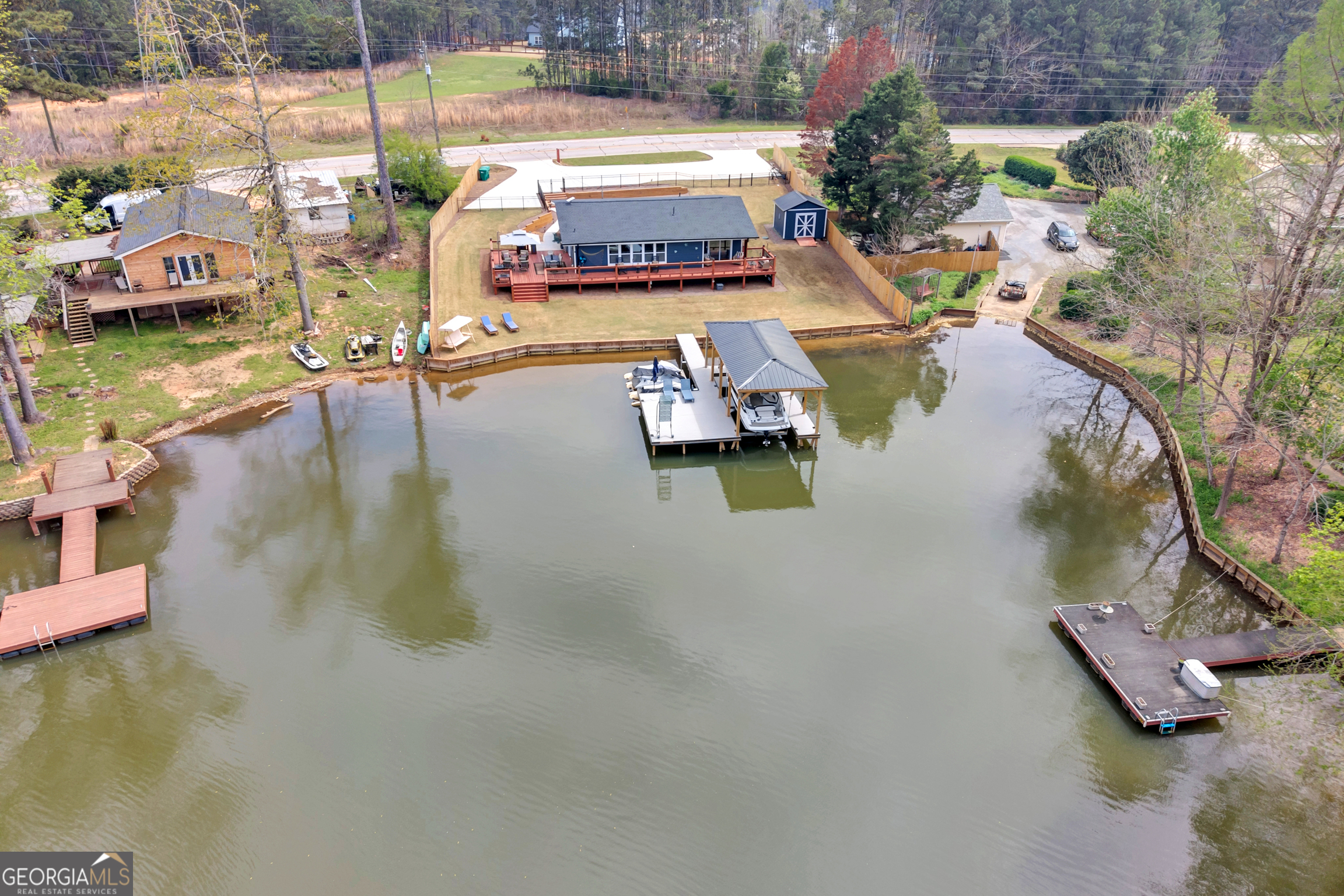 a swimming pool view with a lake view