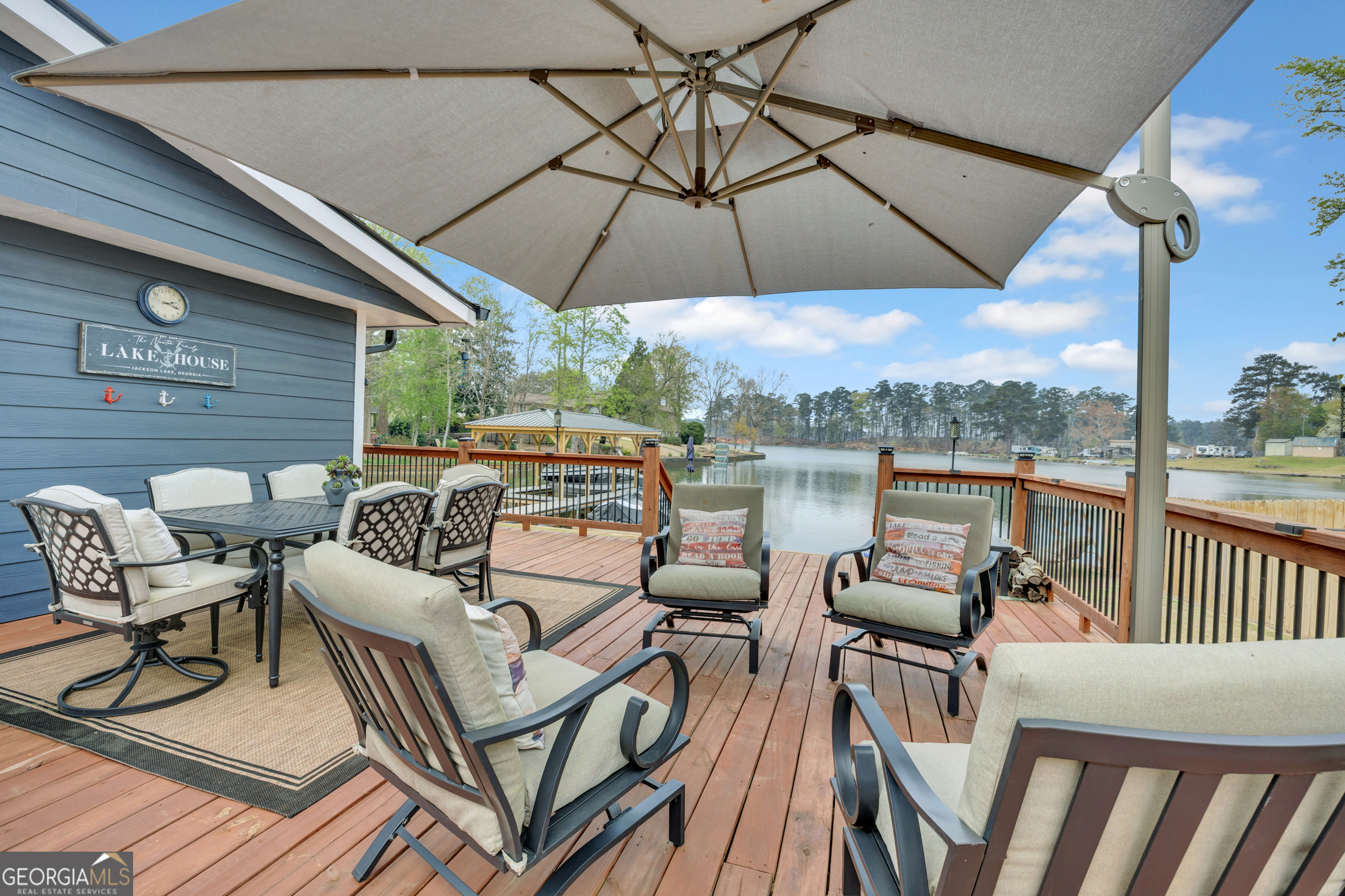 8900 Jackson Lake Road Monticello, GA 31064 - Photo 10 of 72 a view of a roof deck with furniture