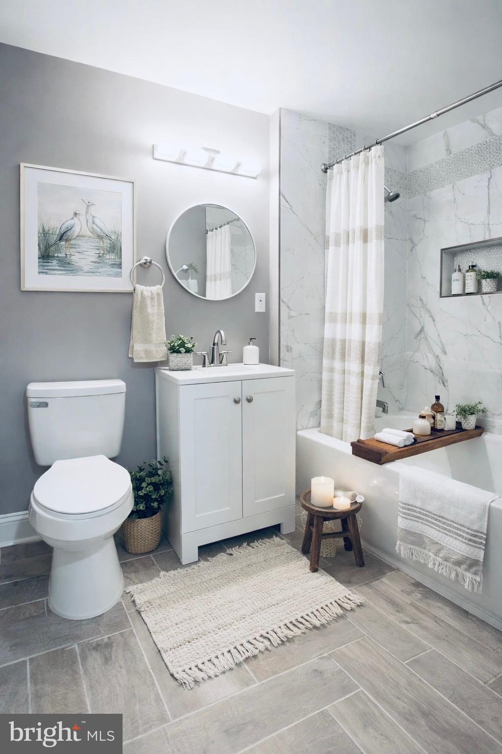 1604 Cliftview Avenue Baltimore, MD 21213 - Photo 16 of 36 a living room with furniture a mirror and a toilet