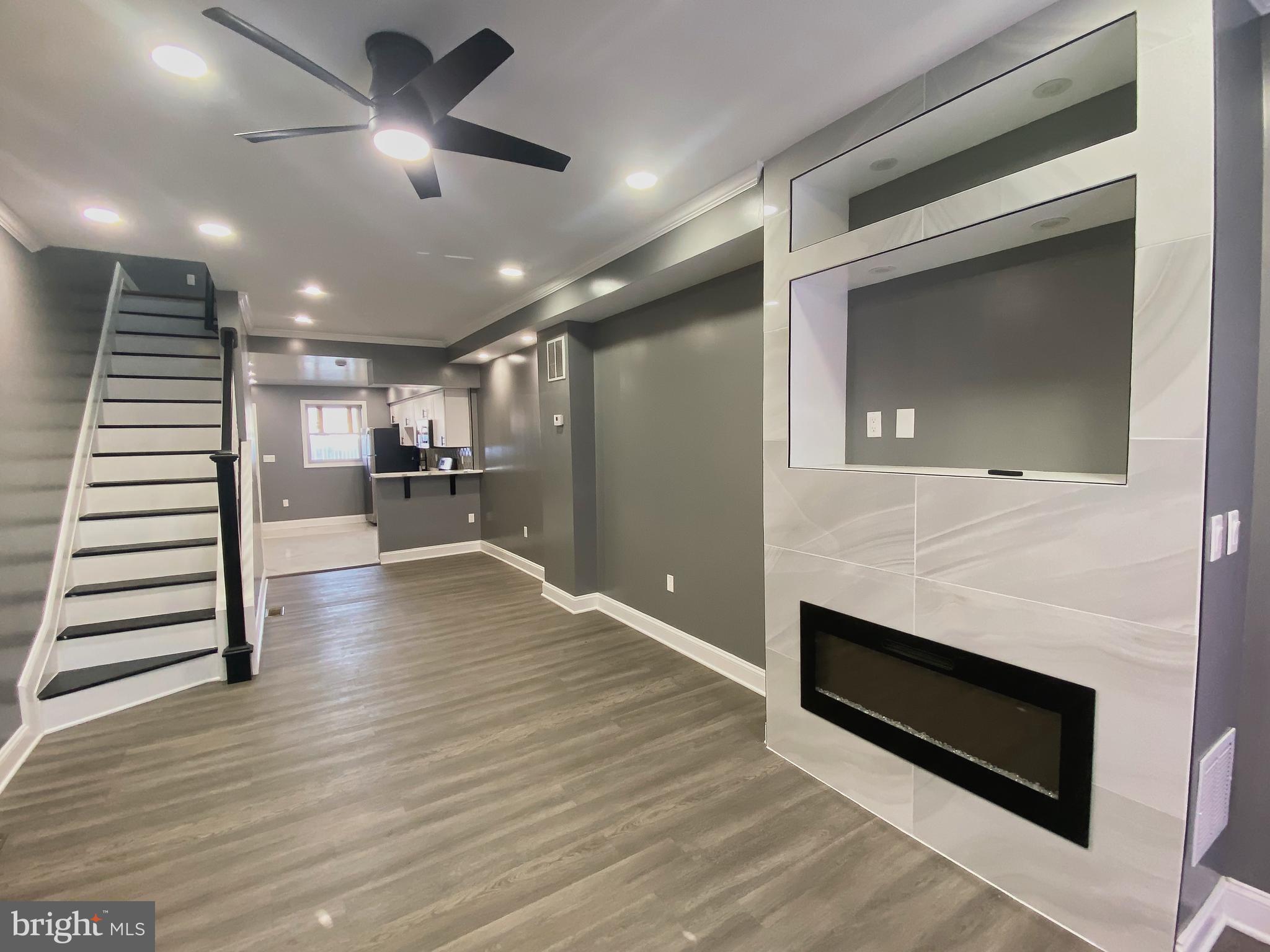 1604 Cliftview Avenue Baltimore, MD 21213 - Photo 35 of 36 a view of kitchen and hall with wooden floor