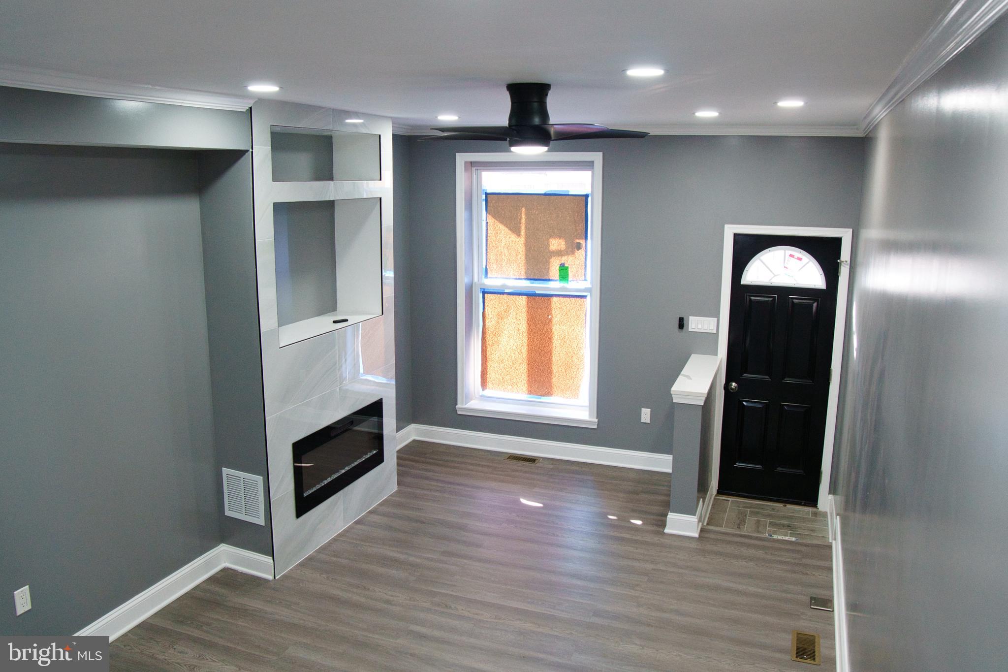 1604 Cliftview Avenue Baltimore, MD 21213 - Photo 3 of 36 a view of livingroom with hardwood floor