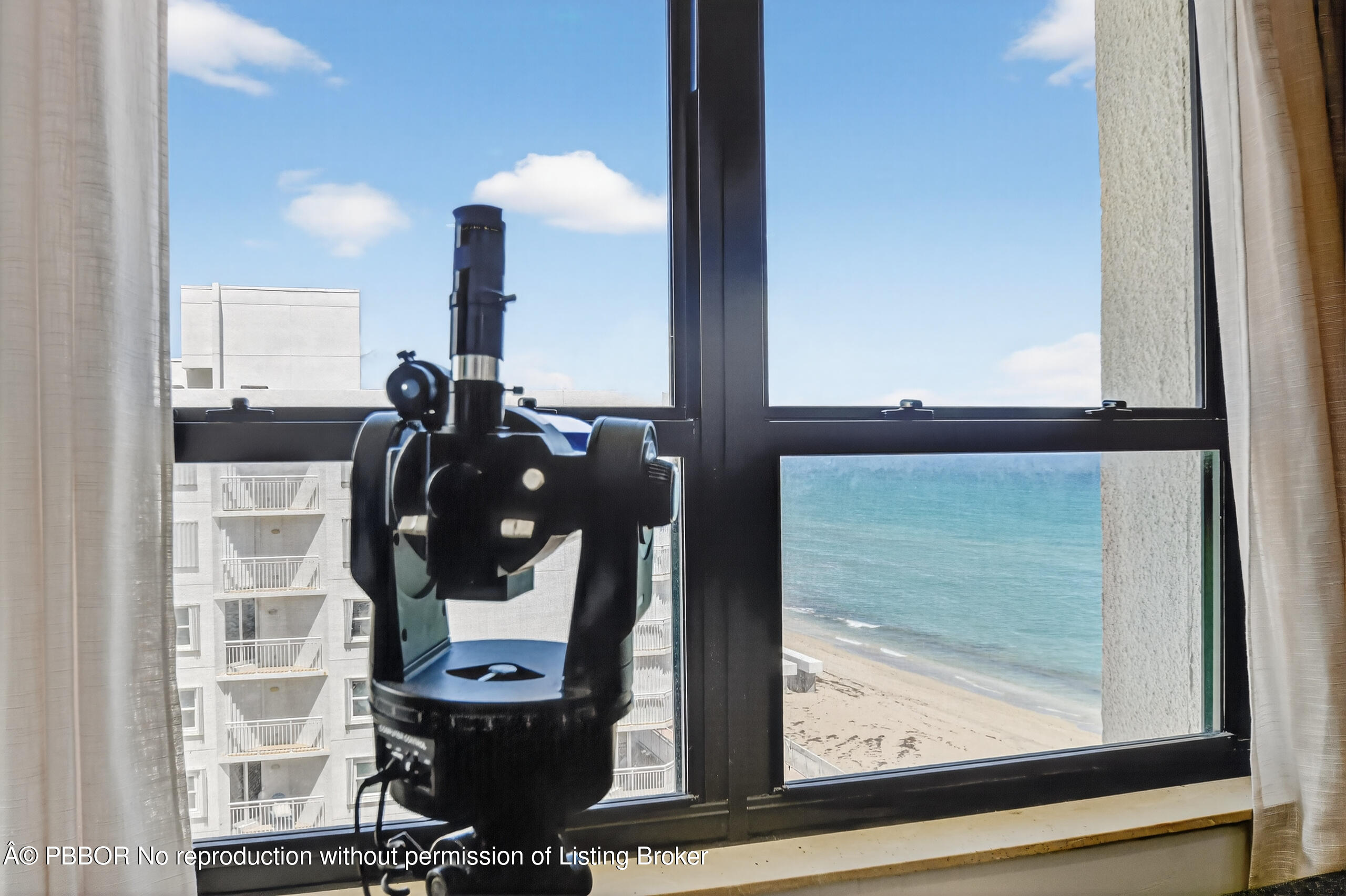 3610 South Ocean Boulevard, Unit 608 Palm Beach, FL 33480 - Photo 13 of 38 a living room with a table and chairs