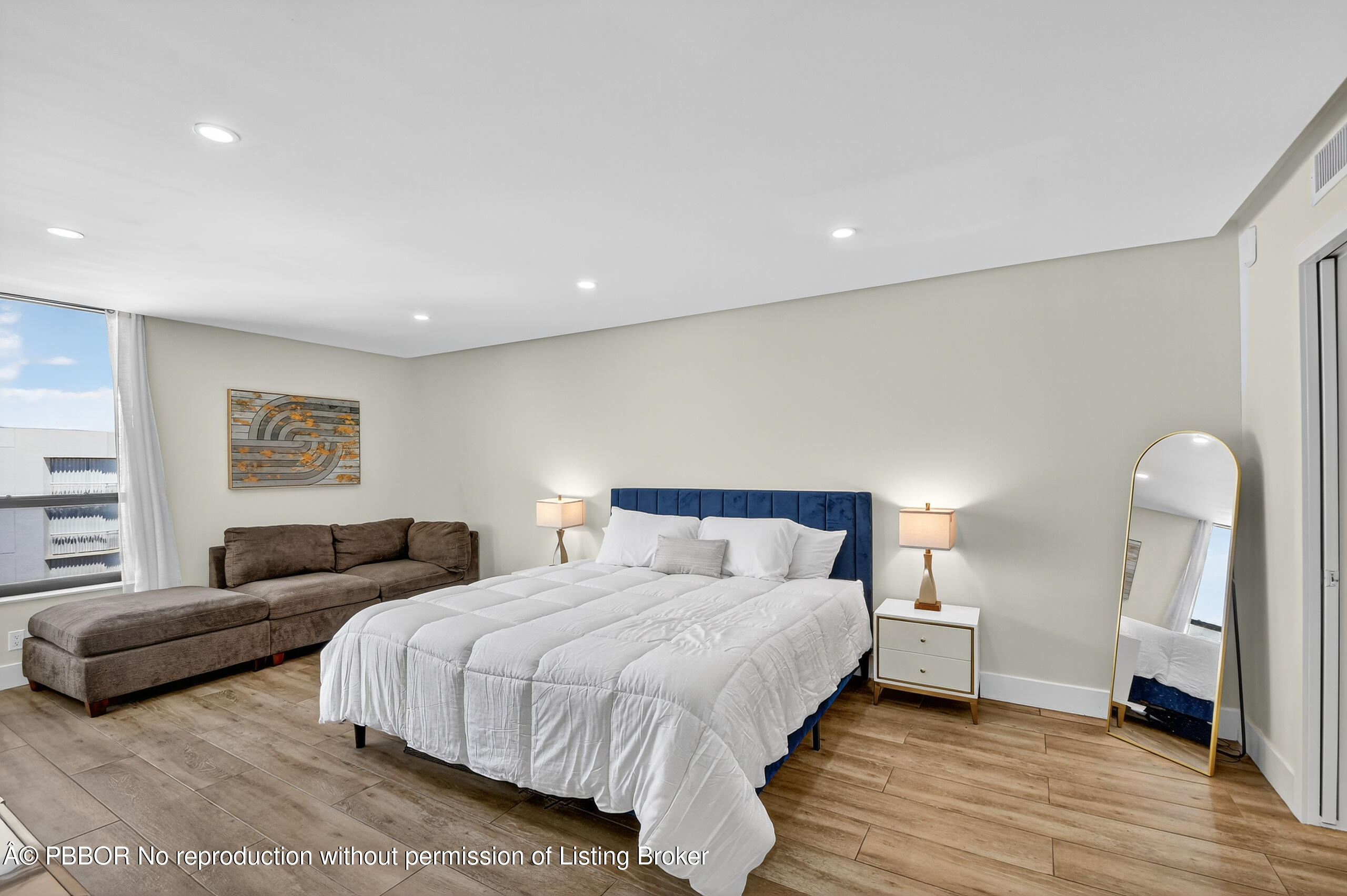 3610 South Ocean Boulevard, Unit 608 Palm Beach, FL 33480 - Photo 9 of 38 a bedroom with double bed and a window