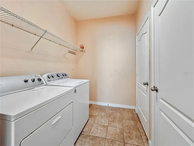 a view of utility room with washer and dryer