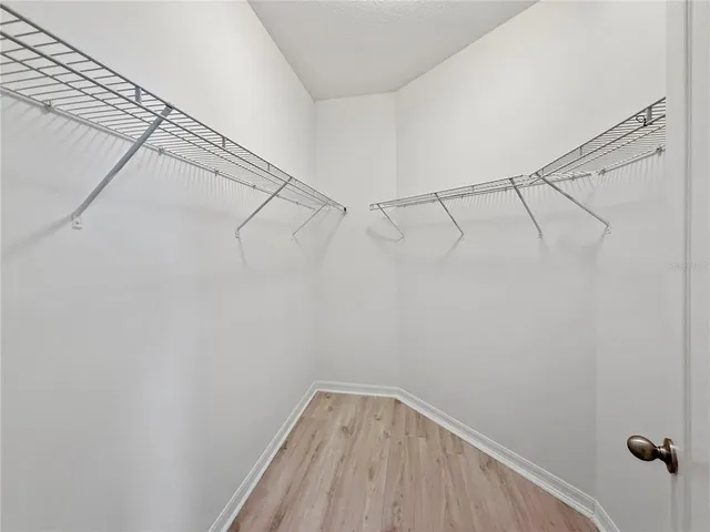 a view of a room with racks on the wall