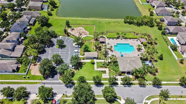 an aerial view of a house with a garden