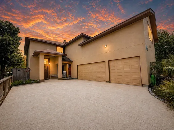 a view of a house with a garage