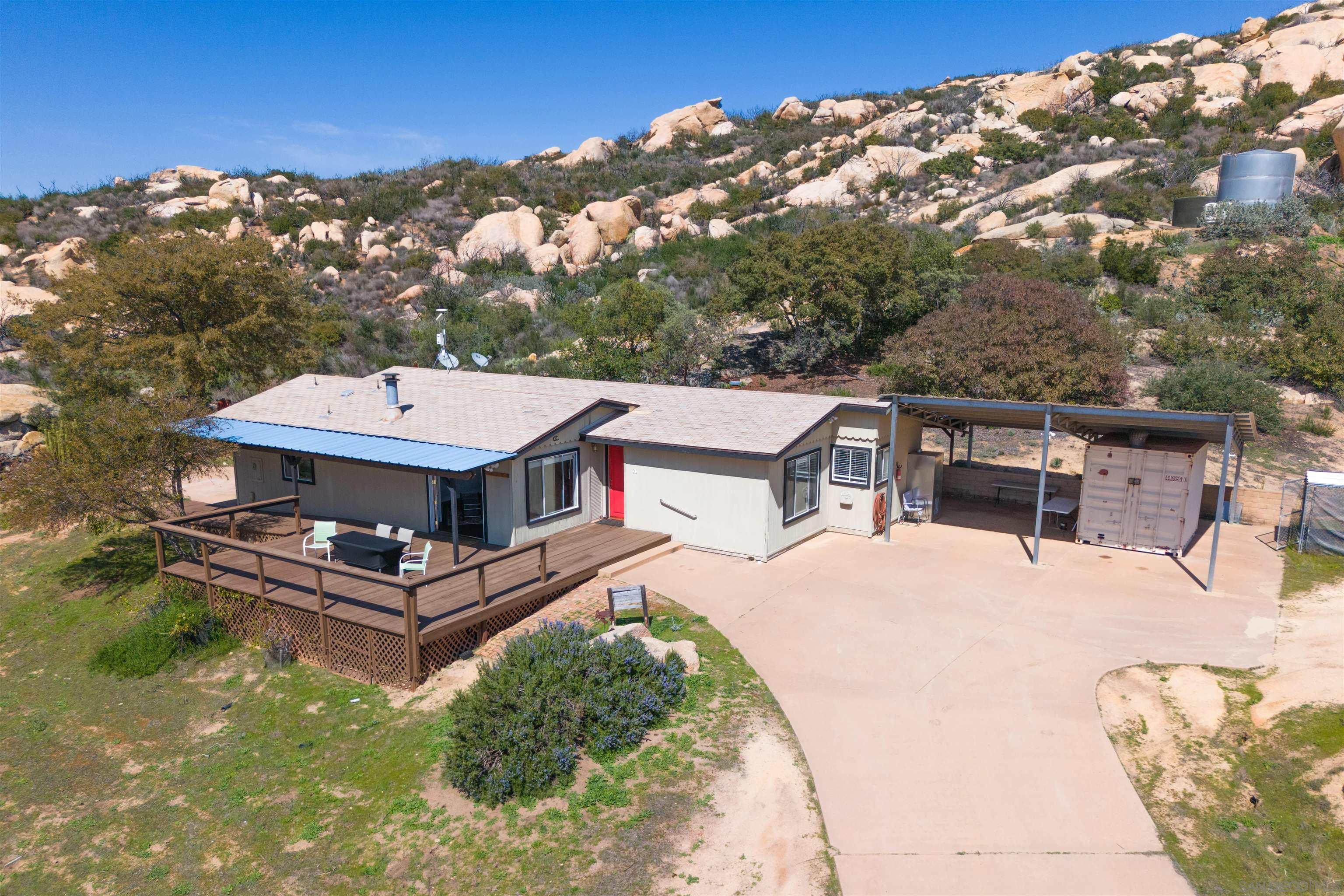 19191 High Glen Road Alpine, CA 91901 - Photo 2 of 10 a view of a balcony with a table and chairs