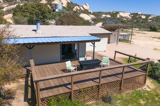 a view of a terrace with furniture