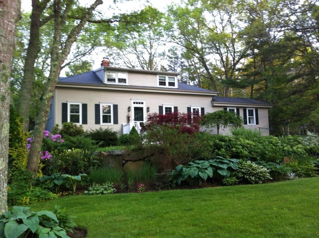 a house view with a garden space