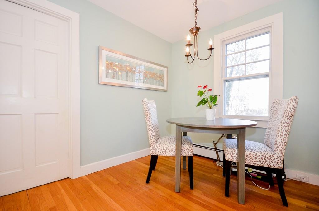 18 Zora Road Marion, MA 02738 - Photo 16 of 37 a view of a dining room with furniture window and wooden floor