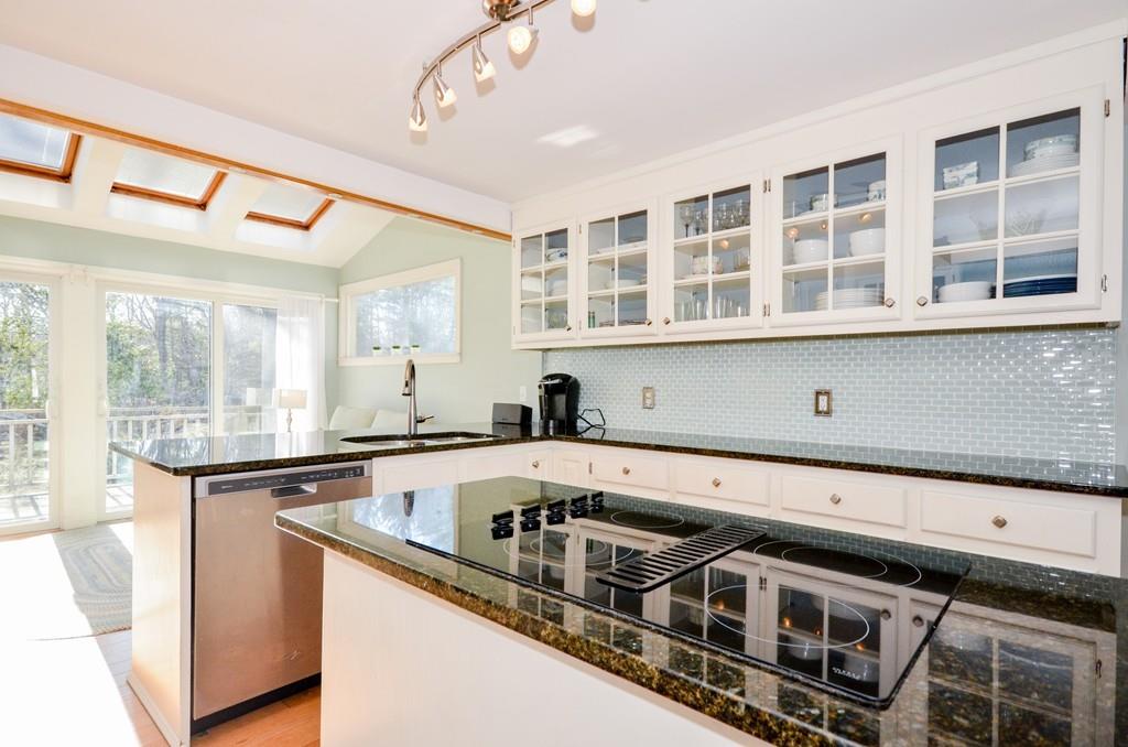 18 Zora Road Marion, MA 02738 - Photo 18 of 37 a kitchen that has a sink and a stove