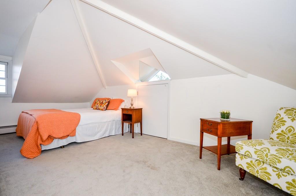18 Zora Road Marion, MA 02738 - Photo 20 of 37 a bedroom with a bed and a couch
