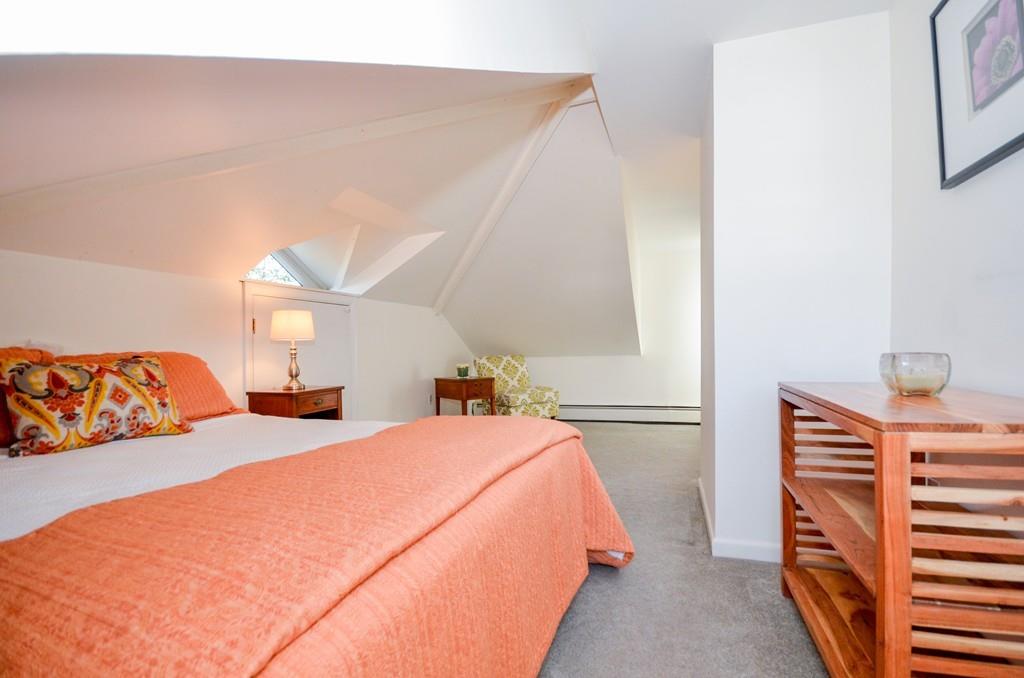 18 Zora Road Marion, MA 02738 - Photo 22 of 37 a bedroom with two beds and a closet