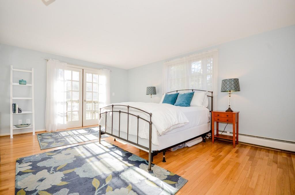 18 Zora Road Marion, MA 02738 - Photo 28 of 37 a bedroom with a bed and a large window