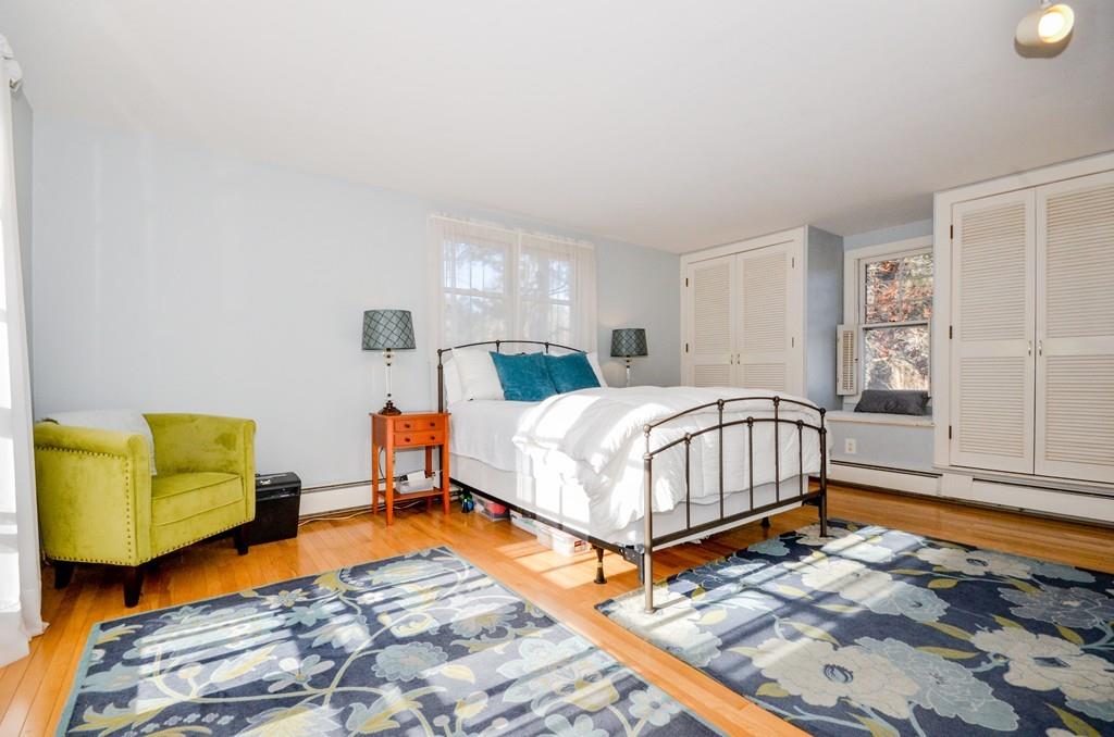 18 Zora Road Marion, MA 02738 - Photo 29 of 37 a bedroom with a bed and blue rug