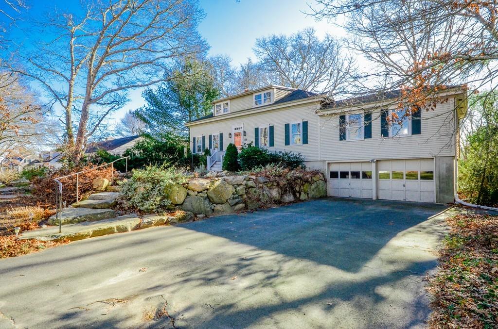 18 Zora Road Marion, MA 02738 - Photo 3 of 37 a view of a house with a yard and potted plants