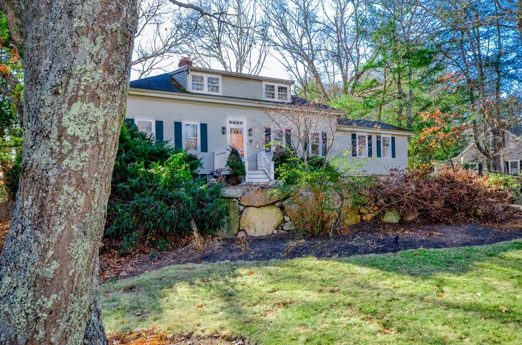18 Zora Road Marion, MA 02738 - Photo 37 of 37 a front view of a house with a yard and shrubs